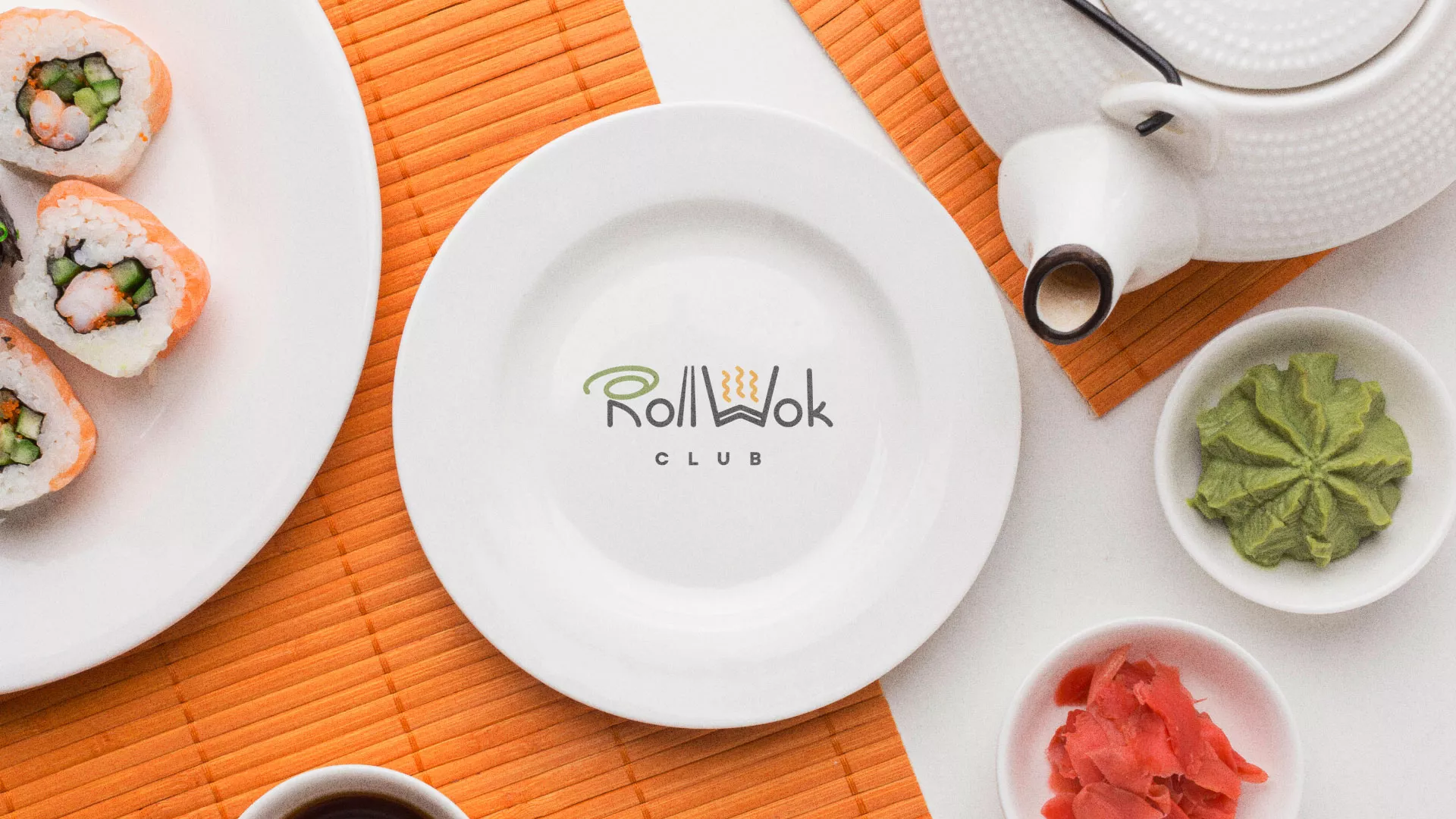 Разработка логотипа и фирменного стиля в Ак-Довураке для суши-бара «Roll Wok Club» Разработка логотипа и фирменного стиля в Ак-Довураке для суши-бара «Roll Wok Club»
